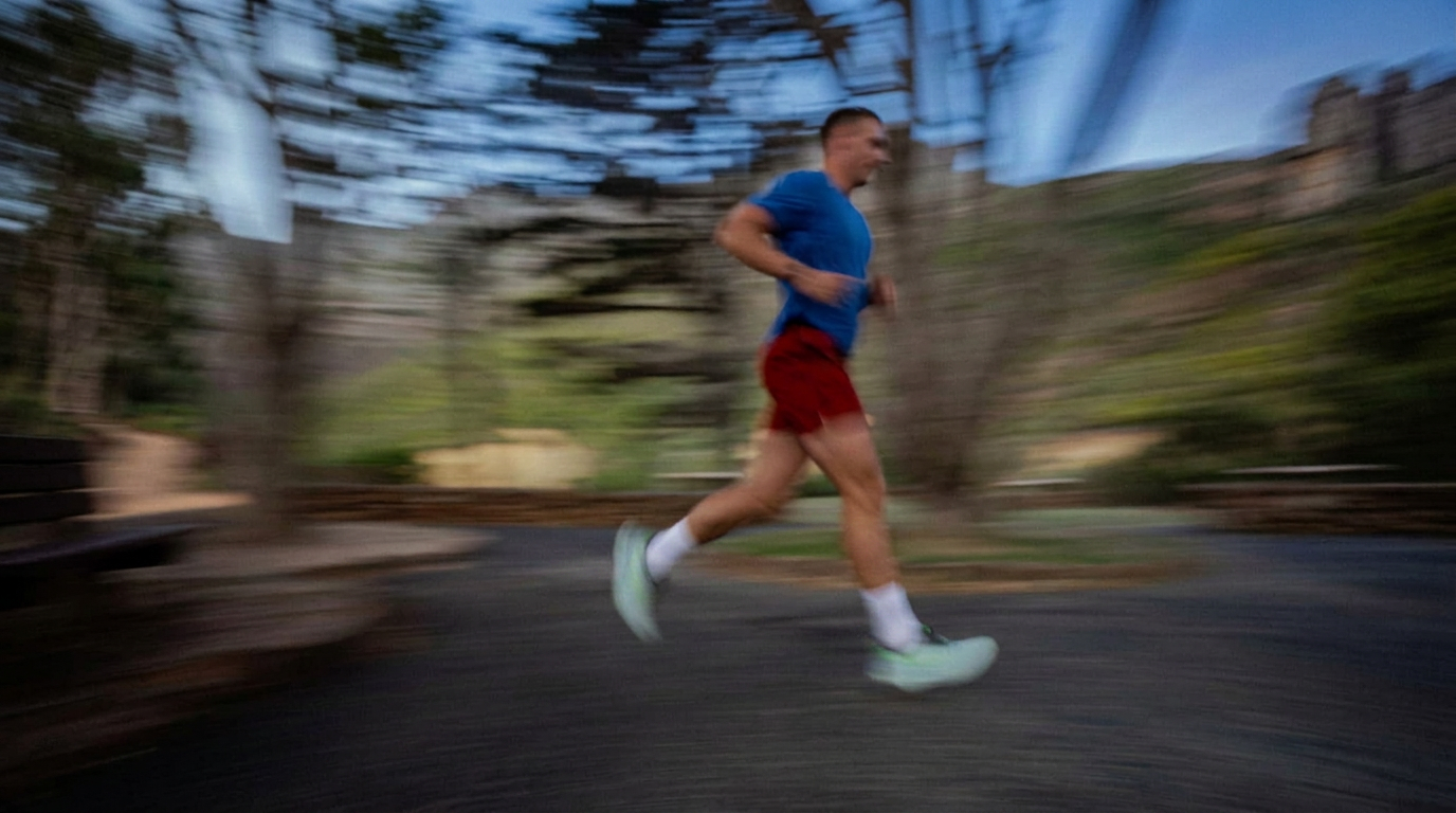 Greg Bolus running on the road